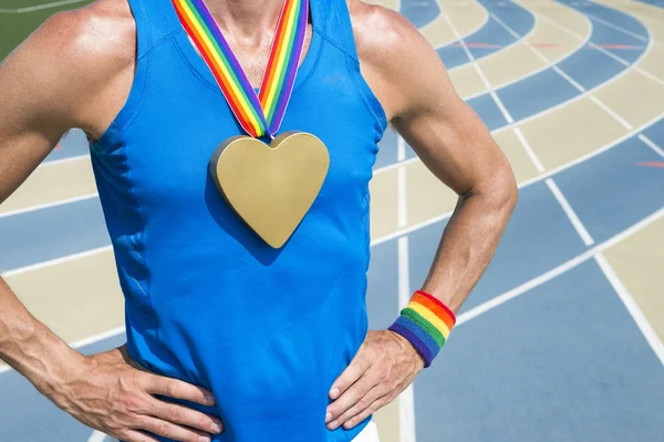 Schwuler Athlet Herz Goldmedaille Laufstrecke Stockbild