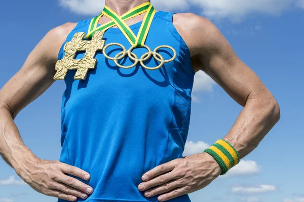 Olympische ringen goud Hashtag atleet — Stockfoto