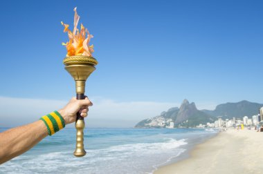 Hand Holding Sport Torch Rio de Janeiro clipart