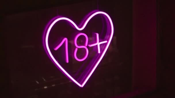 Sex 18 plus shop neon sign showcase window glowing — Stok Video