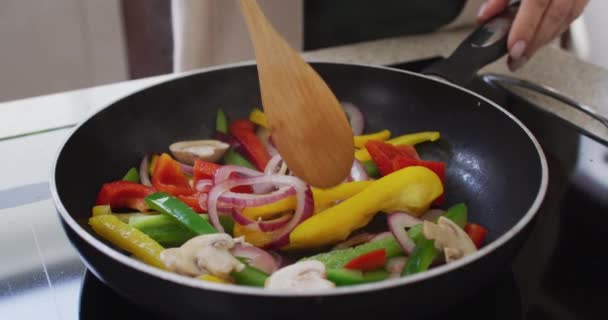 Mid Section Caucasian Woman Home Kitchen Stirring Vegetables Pan Hob — Stock Video