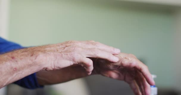 Close Hands Senior Caucasian Man Disinfecting Rubbing Hands Together Cleaning — Stock Video