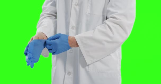 Caucasian Male Doctor Green Screen Background Man Lab Coat Putting — Stock Video