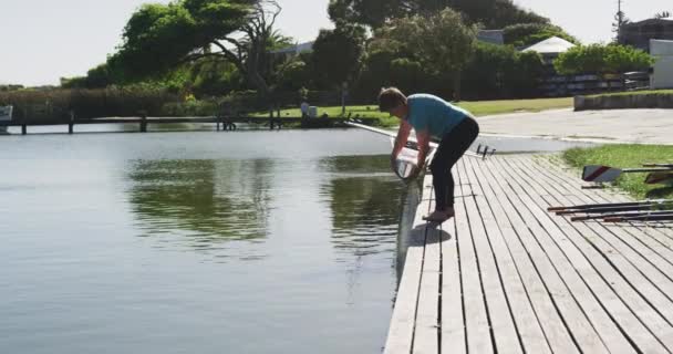 Two Senior Caucasian Women Lowering Boat River Sport Retirement Leisure — Stock Video