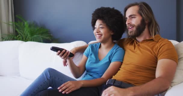 Mixed Race Couple Watching Together While Sitting Couch Home Staying — Stock Video