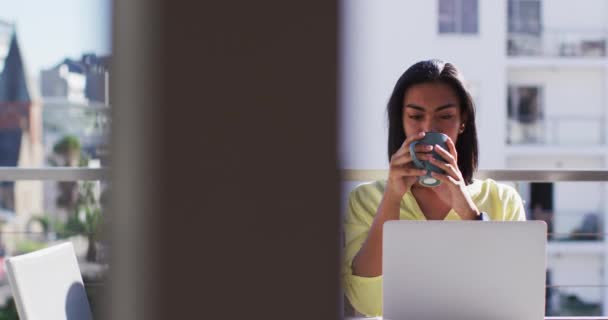 Mixed Race Gender Fluid Person Drinking Cup Coffee Using Laptop — Stock Video