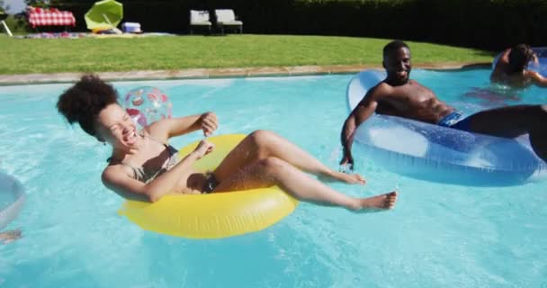 Diverse Group Friends Having Fun Playing Inflatables Swimming Pool Hanging — Stock Video