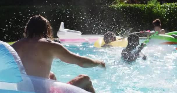 Diverse Group Friends Having Fun Playing Water Guns Inflatables Swimming — Stock Video