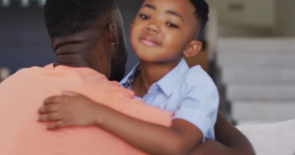 African American Father Son Embracing Couch Staying Home Self Isolation — Stock Video