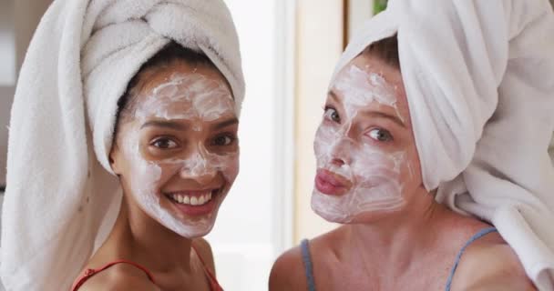 Diverse Happy Female Friends Wearing Towels Heads Cleansing Masks Taking — Stock Video