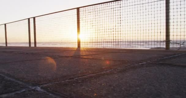 Low Section African American Man Exercising Outdoors Running Seaside Sunset — Stock Video