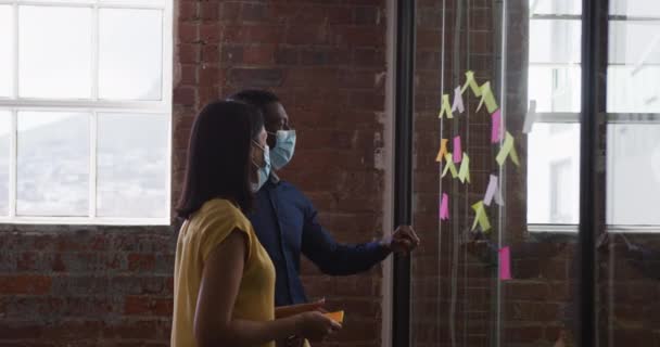 Diverse Male Female Business Colleagues Wearing Face Masks Brainstorming Pointing — Stock Video