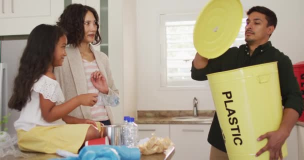 Hispanic Parents Daughter Teaching Segregating Plastic Trash Home Isolation Quarantine — Stock Video