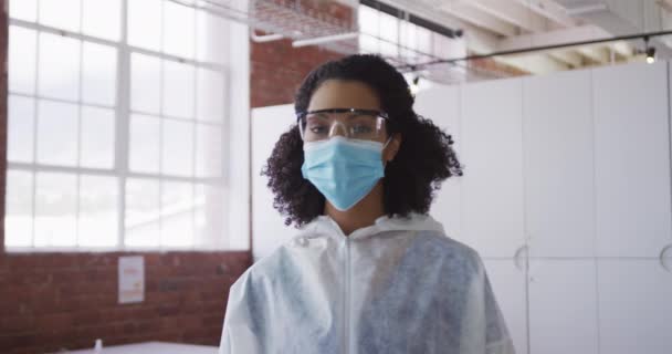 Portrait Mixed Race Female Cleaner Wearing Protective Face Mask Overalls — Stock Video