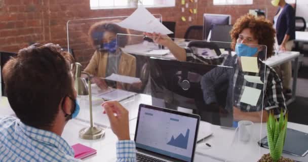 Diverse Business Colleagues Exchanging Documents Sneeze Screen Wearing Face Masks — Stock Video