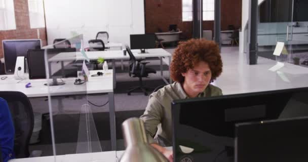Mixed Race Businessman Sitting Desk Sneeze Guard Using Desktop Computer — Stock Video