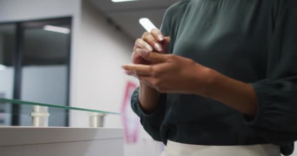 Businesswoman Has Temperature Checked Mixed Race Man Wearing Face Mask — Stock Video