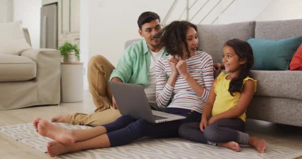 Happy Hispanic Parents Daughter Sitting Floor Using Laptop Home Isolation — Stock Video