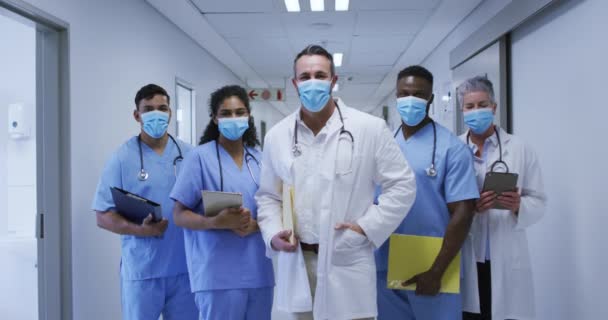 Portrait Diverse Group Male Female Doctors Face Masks Standing Hospital — Stock Video