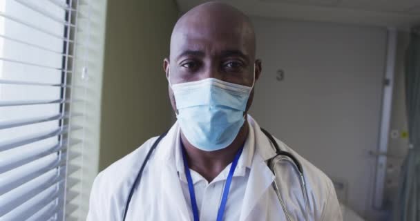 Portrait African American Male Doctor Wearing Face Mask Standing Hospital — Stok Video