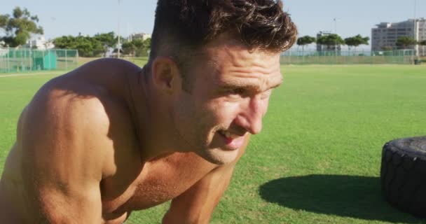 Smiling Fit Shirtless Caucasian Man Recovering Exercising Outdoors Cross Training — Stock Video