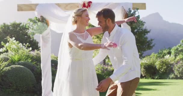 Happy Caucasian Husband Carries Newly Wed Bride Walks Altar Outdoors — Stock Video