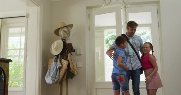 Caucasian Mother Son Daughter Embracing Welcoming Father Coming Home Family — Stock Video