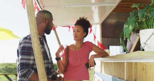 African American Couple Talking Each Other Deciding Order Food Truck — Vídeos de Stock