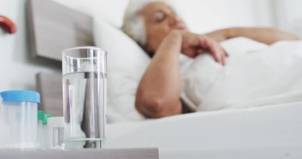 Sick African American Senior Woman Drinking Water While Lying Bed — Stock Video