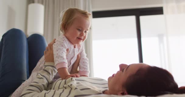 Caucasian Mother Smiling While Playing Her Baby Bed Home Motherhood — Vídeos de Stock