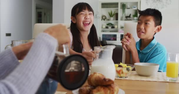 Happy Asian Brother Sister Kitchen Having Breakfast Laughing Parents Happy — Stock Video