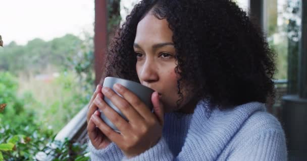 Happy Mixed Race Woman Enjoying Drinking Coffee Standing Balcony Countryside — Video