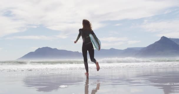 Rear View Mixed Race Woman Running Beach Sea Carrying Surfboard — Stock Video