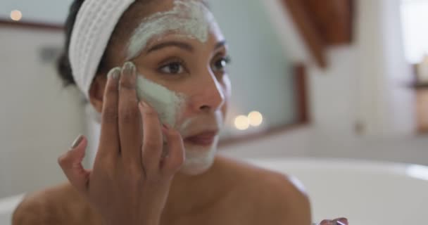 Mixed Race Woman Taking Bath Applying Beauty Face Mask Domestic — Stock Video