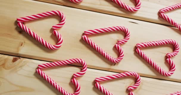 Video Bastones Caramelo Rojo Blanco Sobre Fondo Madera Navidad Tradición — Vídeo de stock