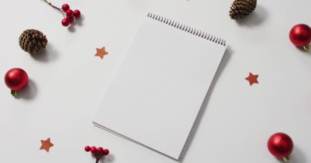 Video Red Christmas Decorations Notebook White Background Christmas Tradition Celebration — Stock Video