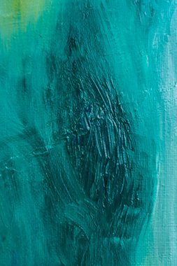 Resimdeki bir fırçayla yapılmış tek renkli bir arkaplan. Renklerin basit bir arkaplanı. Mavi yeşil tek renkli bir renktir..
