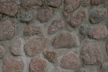 Taşın dokusu, çimentoyla bağlanmış büyük taşlar..