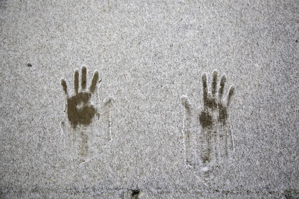 Handprint in snow, winter and december, texture symbol