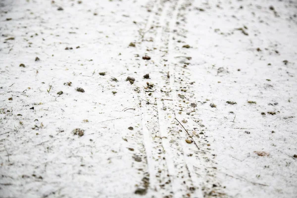 Wheel marks on snowy road, nature and vehicles, dangerous transport