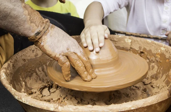 Hands working mud — Stock Photo, Image