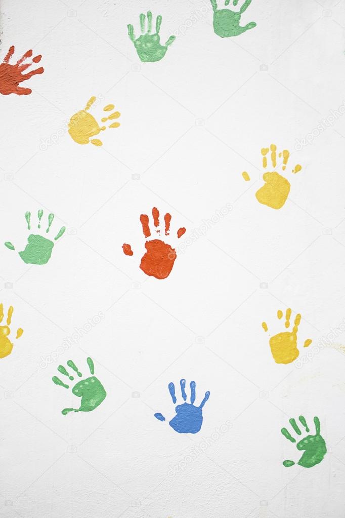 Hands colorful wall