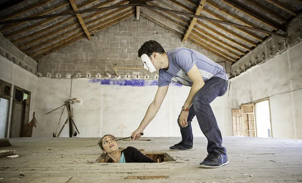 Young woman stabbing — Stock Photo, Image