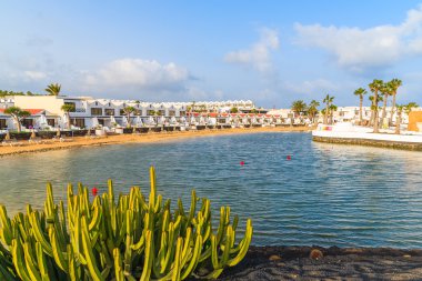 Holiday apartments in Costa Teguise seaside resort town clipart