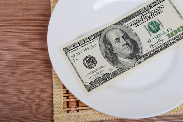 American US Dollar money on white plate — Stock Photo, Image