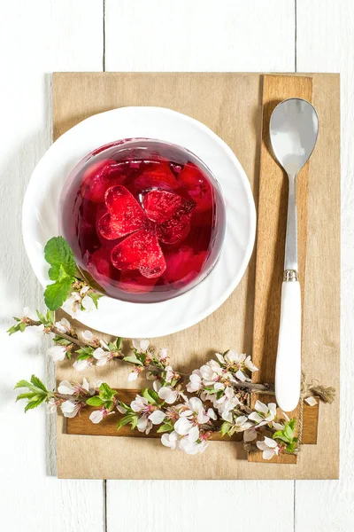 Körsbär gelé och körsbärsblommor grenar — Stockfoto