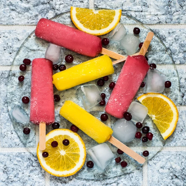 Delicious fruit ice with orange and cranberries — Stock Photo, Image