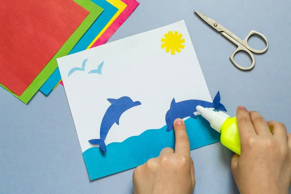 The child making the applique on the marine theme — Stock Photo, Image