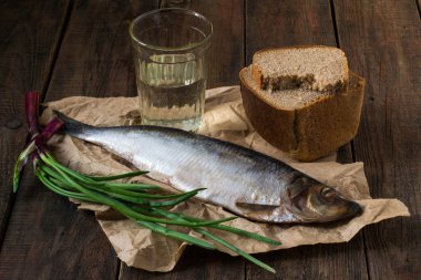Salted herring, vodka, green onions and black bread 