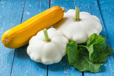 Two pattypan squash and yellow zucchini 